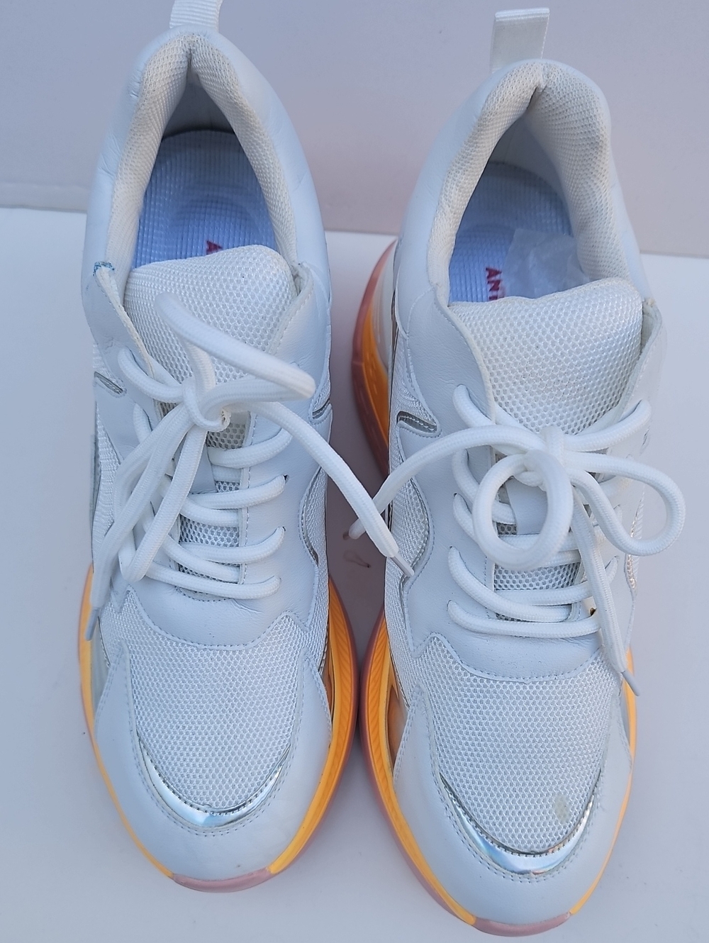 White Women's Chunky Sneakers with Orange Sole Accent